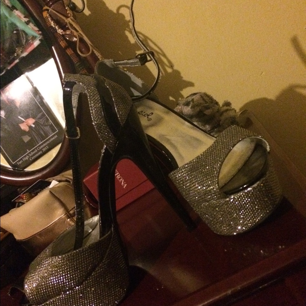 Black and silver high heel.